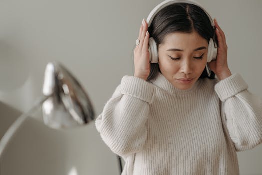 person relaxing listening to music mindfully